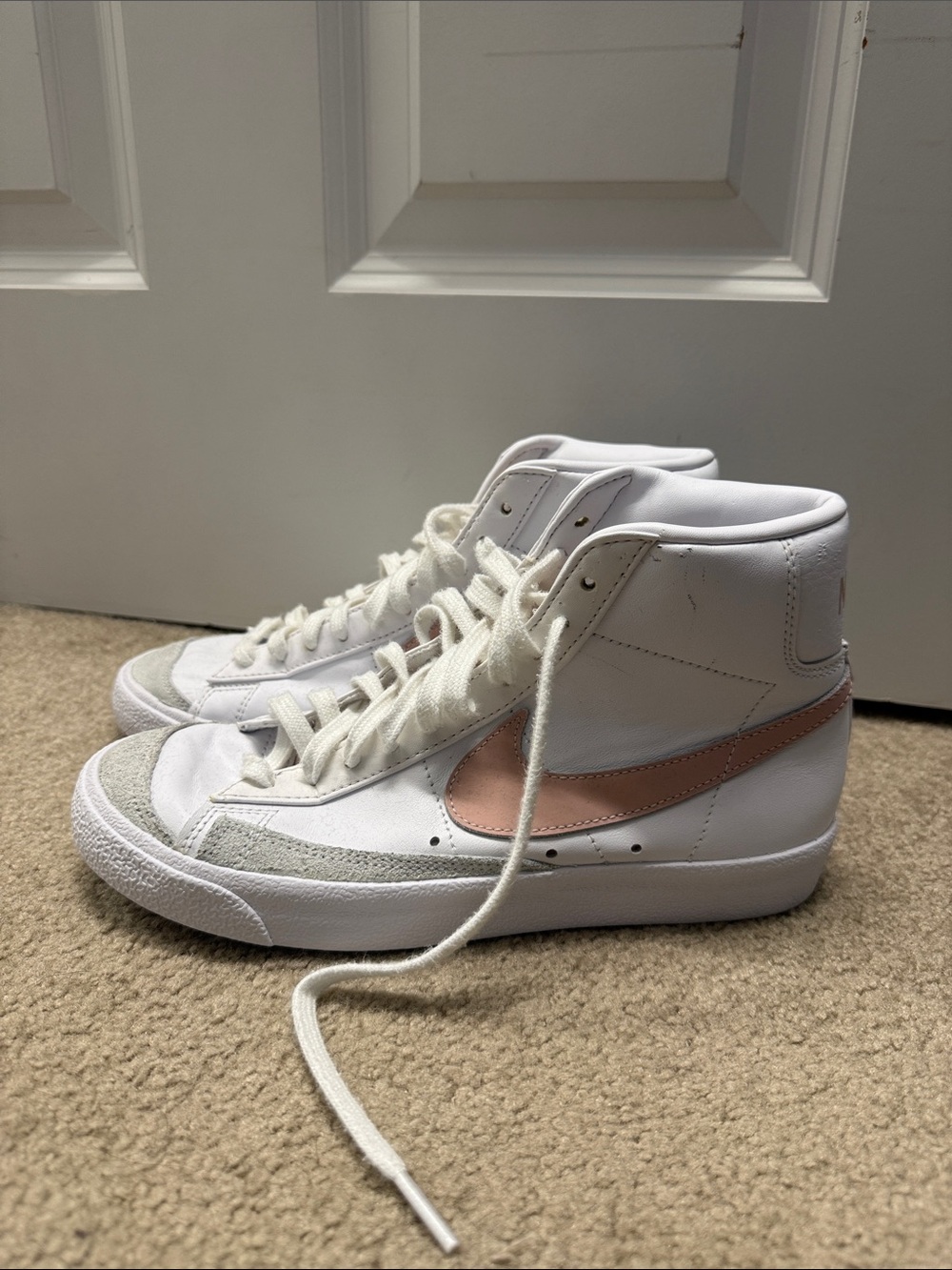 Women's High-Top Nike Blazers with Pink Swoosh